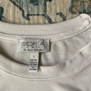 White Crewneck Short Sleeved Tee with shaping off both hips by SOFIA Vergara